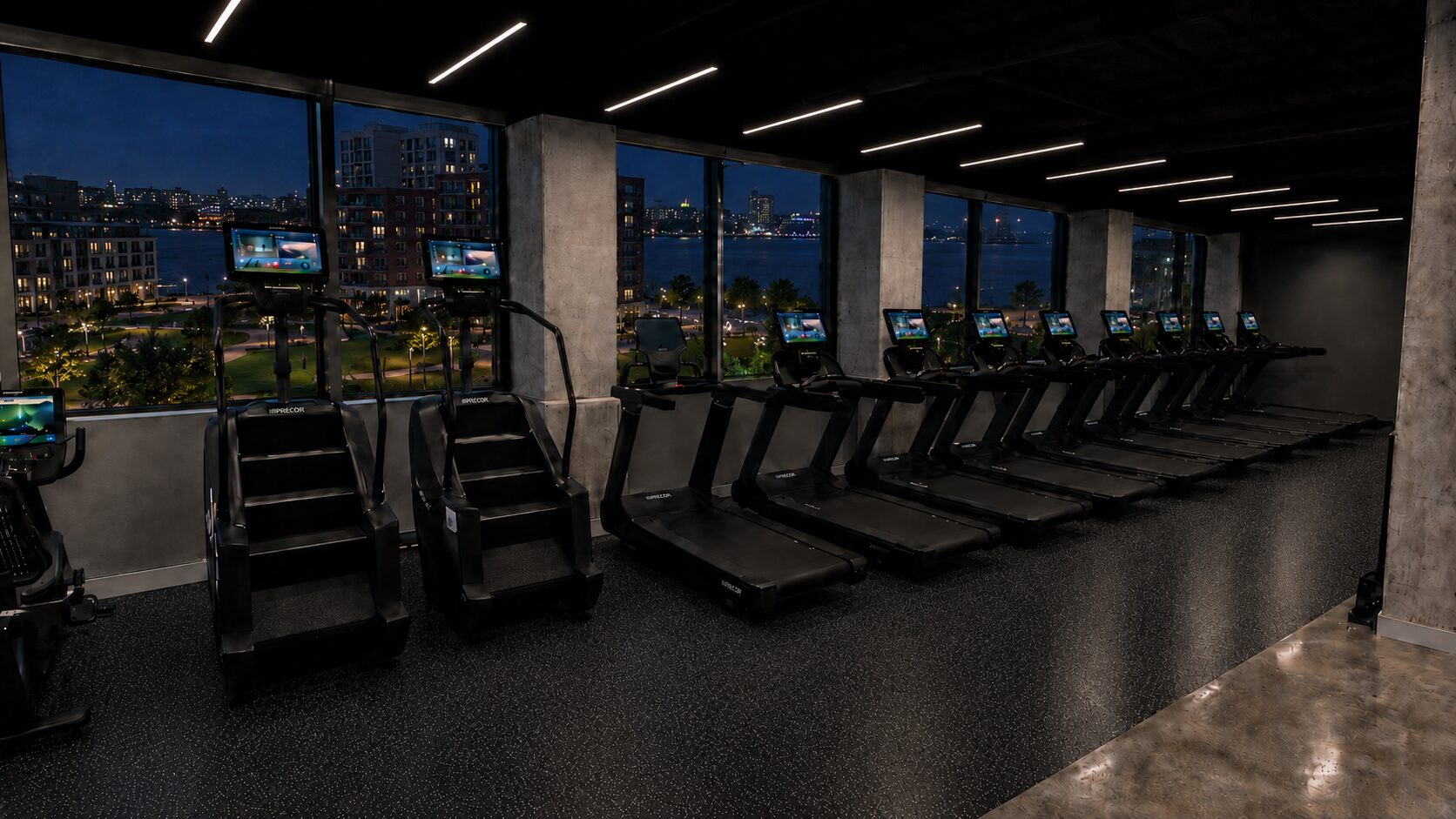 Maxwell Place treadmills overlooking the Manhattan skyline - City Fitness Hoboken